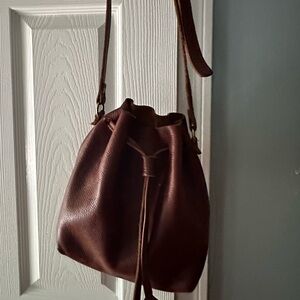 Portland leather small bucket crossbody bag